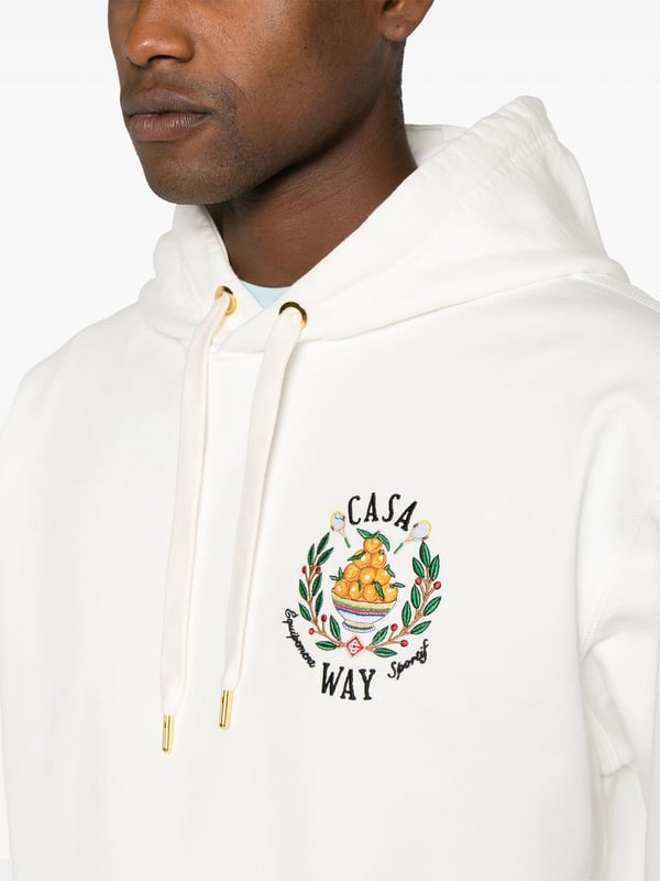 A crest motif is embroidered at the chest of this Casa Way hoodie from Casablanca, referencing the brand's country club-inspired aesthetic.
