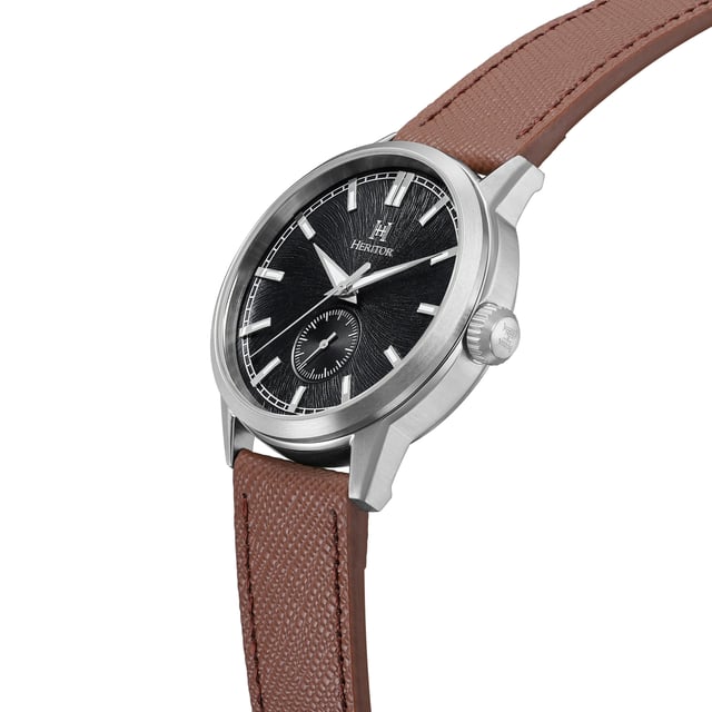 316L Surgical-Quality Stainless Steel Case, Jeweled Automatic Movement, Jewel Bearings: 22 Jewels, 36-Hour Power Reserve, Beats per Hour (BPH): 21600/Hour, Sapphire-Coated Mineral Crystal, Engraved Pattern Dial, Observation Caseback to view Movement, Logo-Engraved Crown, Genuine Leather Pattern-Embossed Strap, Logo-Engraved Stainless Steel Clasp, Luminous Hands, Luminous Markers, Dual Time Sub-Dial, 45mm Case Diameter, 195-245mm Wrist Size, 10 ATM Water Resistance.