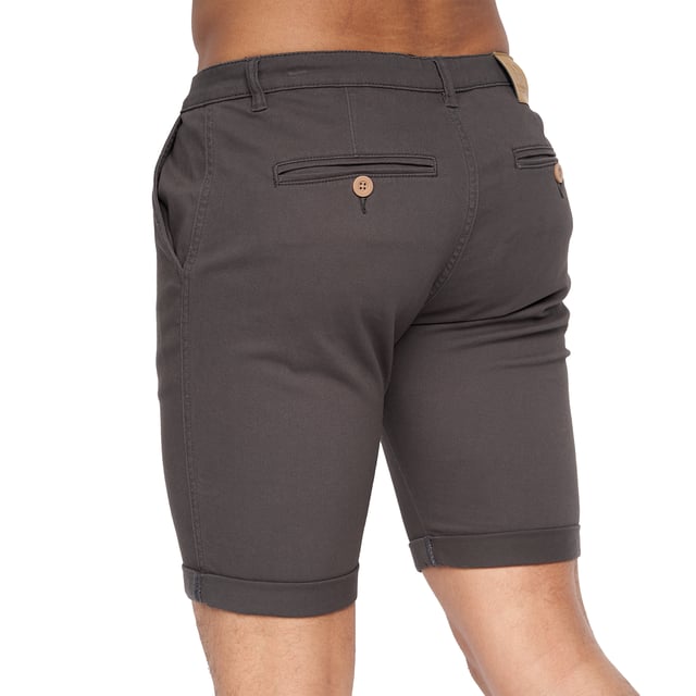 98% Polyester, 2% Elastane. Fabric: Canvas, Stretch. Design: Logo. Pockets: 2 Side Pockets, 2 Back Pockets, Jet Pocket, Buttoned. Fastening: Button, Zip Fly. Style: Chinos. Back Yoke, Belt Loops, Darted, Gripping Inner Waistband, Mock Horn Buttons, Self Fabric, Twin Needle Stitch.