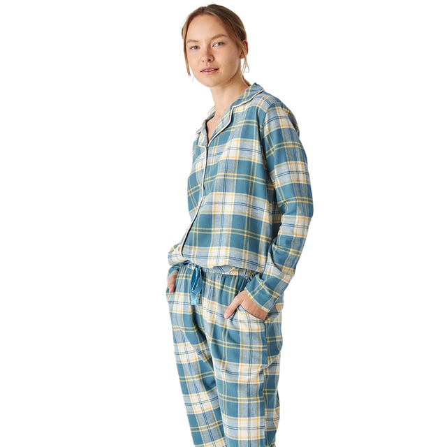 Women's long-sleeved pajamas with an elegant and comfortable design, ideal for lounging or relaxing at home.

 Its modern and sophisticated design adapts perfectly to the female figure, enhancing the silhouette with a chic and relaxed style.

 The set includes a long-sleeved top with buttons down the front, which provides practicality and a touch of style.

 The long pants have a loose fit and an elastic waistband that can be adjusted with drawstrings.

 Additionally, both the top and pants feature a checkered print, which adds a classic touch.

 The entire pajama set is made of cotton, a soft and breathable material, perfect for any time of year.

 Made from light and soft materials, it is perfect for any time of year.
 Composition: T-shirt: 100% Cotton; Pants: 100% Cotton
 Care:
-Machine wash cold on gentle cycle to prevent wear and tear on fibers.
 -Do not use bleach or whiteners
 -Line dry or tumble dry low to prevent shrinkage or loss of shape.
 -Iron at low temperatures.