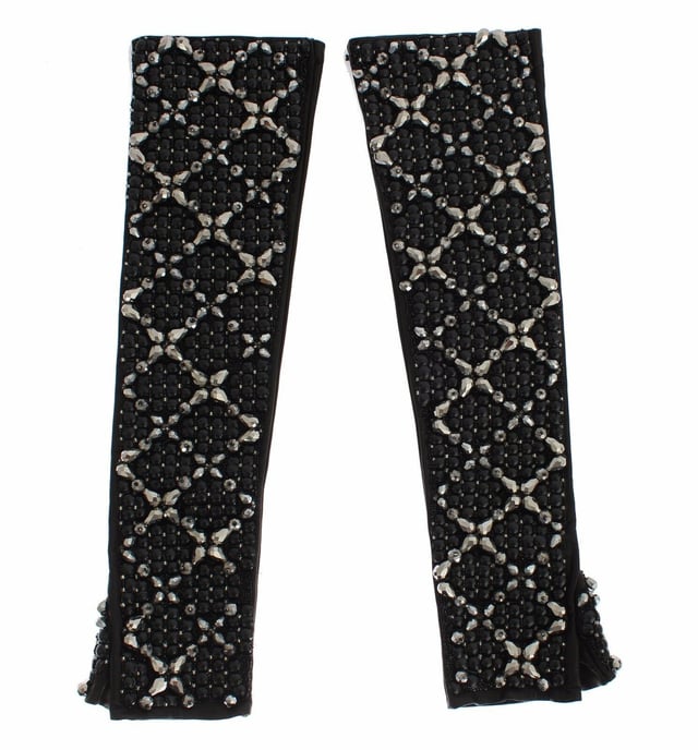 Gorgeous brand new with tags
  100% Authentic Dolce & Gabbana black leather
  Finger-free design
  Elbow length
  Black color with black and silver crystal beads
  Logo details
  Limited edition
  Made in Italy
Material: 100% Leather