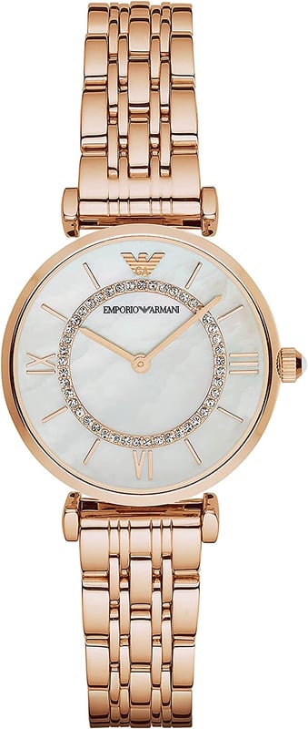 This Emporio Armani Gianni T-bar Analogue Watch for Women is the perfect timepiece to wear or to gift. It's Rose Gold 31 mm Round case combined with the comfortable Rose Gold Stainless steel watch band will ensure you enjoy this stunning timepiece without any compromise. Operated by a high quality Quartz movement and water resistant to 3 bars, your watch will keep ticking. This Elegant and practical watch is perfect for all occasions. It’s a great gift for your relatives and friends High quality 19 cm length and 13 mm width Rose Gold Stainless steel strap with a Deployment clasp Case diameter: 31 mm,case thickness: 7 mm, case colour: Rose Gold and dial colour: Mother of pearl