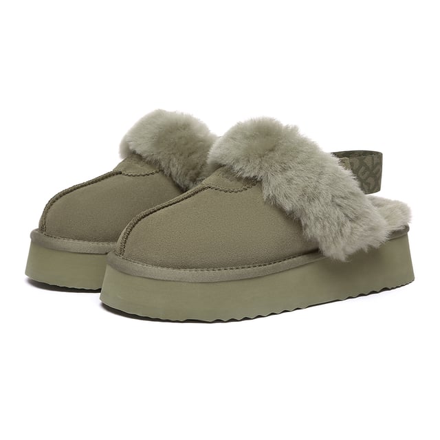 Met maximale gezelligheid en een beetje lift. Ervaar de modieuze aantrekkingskracht van de Wagtail-slippers. Het bovenwerk van rundsuède is behandeld met een waterafstotende coating. De toegevoegde functie van een afneembare riem betekent dat je ze met of zonder kunt dragen, wat geweldig is voor extra flexibiliteit bij het combineren van je outfits. Specificatie: Suède bovenwerk Warme schapenvacht Wollen voering Zachte schapenvachtwollen binnenzool EVA-zool Technologieën: Water & Vlekbestendig bovenwerk Slipvaste buitenzool