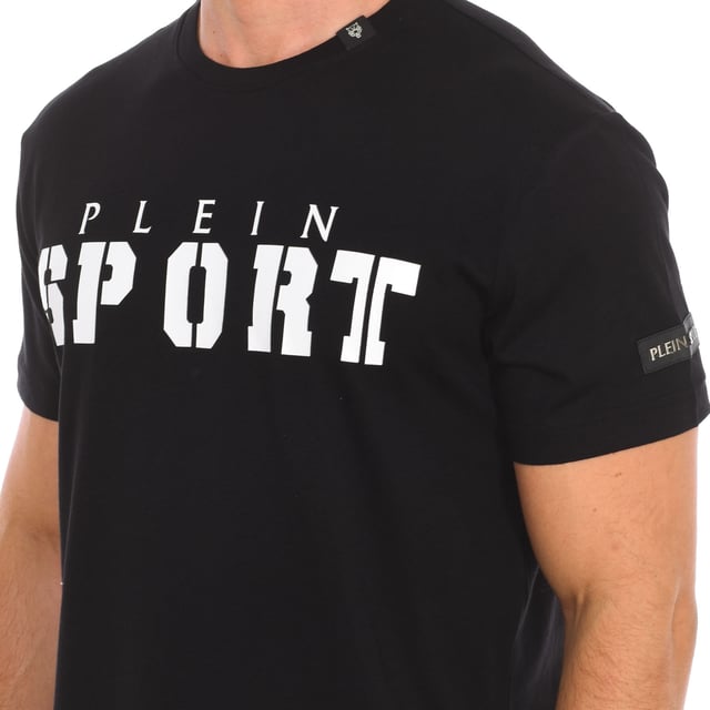 Plein Sport short sleeve t-shirt.
 Round neckline with ribbed finish.
 Brand print on the front.
 Claw print on the back side.
 Brand insignia on one sleeve.
 Seams seen in tone.
 Composition: 100% cotton
 Care:
Wash at maximum temperature 30º.
 Iron at medium temperature.
 Do not use dryer.
 Do not use bleach.
 Do not dry clean.
