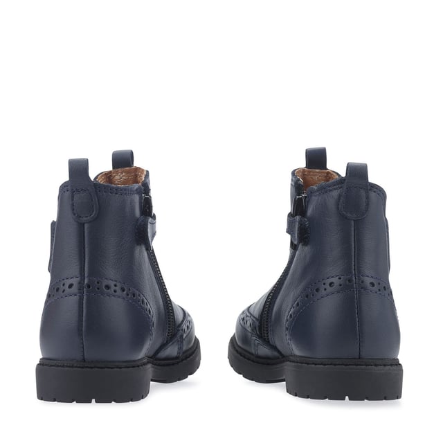 Our classic meets modern Chelsea boot is an easy pull-on. Durable, lightweight and comfy for wearing all day long. Beautifully made with a pretty floral design on the elastic and classic brogue detailing in a soft navy blue leather. Features side zip fastening and elastic side for slipping on/off with ease. Small feet stay warm and dry in durable soft leather. Perfect for both smart and casual wear.
