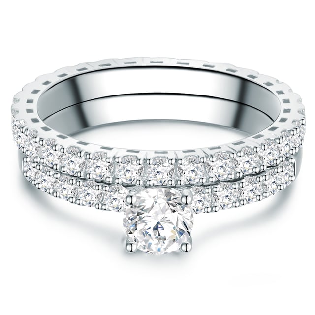 If you are looking for a very special accessory for engagement, this exclusive ring set will make the perfect decision. The engagement ring is half filled with zirconia crystals and is crowned by a solitaire in a recording. An enchanting addition is the fully occupied band ring, which can be worn both solo and as a pretense ring. A sparkling ring duo in which your loved one is guaranteed to fall in love immediately! The zirconia crystals in the elaborate brilliant cut are caught in filigree ring rails made of rhodium -plated sterling silver - an affordable alternative to expensive diamond rings.