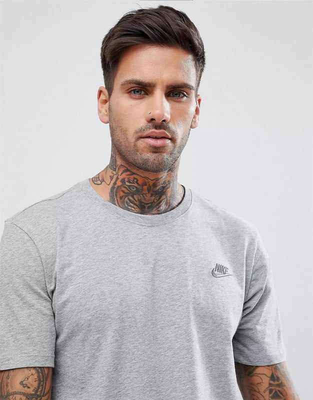 Nike Crew Neck Club Mens T Shirt.     
Cotton Jersey Tee.     
Ribbed Crew Neck and Short Sleeves.     
Embroidered Swoosh and Nike Logo.          
Standard Fit for A Relaxed, Easy Feel.