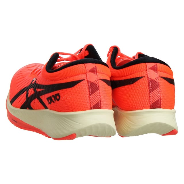 The Asics MetaRacer Tokyo Women's Red Running Trainers are a premium choice for female runners who demand exceptional performance and style. These trainers are designed to offer a competitive edge for racing and high-intensity runs while providing a bold and fashionable look. Here's a detailed description with key features:

 Race-Ready Design:  The MetaRacer Tokyo trainers by Asics are specifically designed for racing and high-performance running. Their lightweight and aerodynamic design aim to enhance speed and efficiency.

 Top-Quality Materials:  Asics is known for using high-quality materials in their footwear. These trainers are typically constructed from top-tier materials, ensuring durability, support, and comfort.

 Vibrant Red Color:  The trainers come in a vibrant red color with eye-catching accents, providing a bold and dynamic look that stands out during races and training sessions.

 Responsive Cushioning:  These trainers feature a responsive midsole that offers excellent energy return, ensuring that each stride propels you forward with maximum efficiency.

 Carbon Plate Technology:  The MetaRacer Tokyo trainers often incorporate a carbon plate in the midsole, which enhances stability and helps maintain a consistent stride during races.

 Secure Lace Closure:  The trainers typically feature a lace-up closure system that ensures a secure and customizable fit tailored to your foot shape.

 Minimalist Upper:  The upper of the shoes is designed to be lightweight and breathable, promoting airflow and reducing weight to keep you cool and comfortable during intense runs.

 Durable Outsole:  The outsole is designed to provide excellent traction and durability, ensuring grip and stability during races on various surfaces.

 Asics Branding:  You can expect to find Asics branding elements, such as the Asics logo or label, integrated into the trainers' design, reflecting the brand's commitment to quality and performance.

The Asics MetaRacer Tokyo Women's Red Running Trainers are the ultimate choice for female runners who are serious about achieving their best performance. Their striking red color and advanced features make them a standout option for those who want to make a statement on the track or during high-intensity runs.