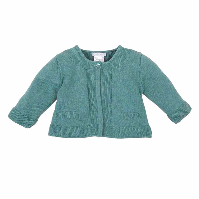 Tricot knit jacket.
 Round neck.
 Button closure on the front.
 Long sleeve.
 Flared cut.
 Seams seen in tone.
 Composition: 75% Cotton, 20% Polyamide, 5% Wool
 Care:
- Wash maximum at 30ºC.
 - Iron at medium temperature, max. 110ºC.
 - It is not allowed to use a dryer.
 - Do not use bleach.
 - Does not support dry cleaning