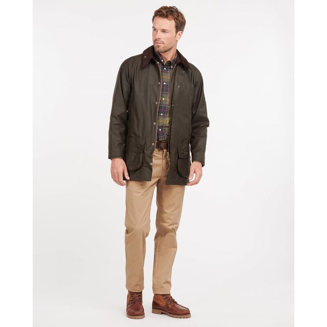 The Classic Beaufort is a stylish, practical men's waxed jacket with timeless country looks and a Sylkoil outer.
Quintessentially Barbour, this versatile jacket is tough enough to brave the great outdoors yet equally suited to city wear - it offers a relaxed fit perfect for throwing over a suit when commuting to work. Ideal for year-round use, it boasts a 100% cotton lining in Barbour's iconic tartan print, with an interactive zip designed for pairing with an optional quilted liner when extra insulation is needed.
The Classic Beaufort's smart corduroy collar feels luxuriously soft and is studded to take an optional hood, while the two-way zip, studded storm fly front and Velcro-fastening wind cuffs seal out draughts. Two lower bellow pockets offer plenty of room for essentials, and moleskin-lined handwarmer pockets provide welcome warmth on cold days. A useful rear game pocket completes the impressive line-up of functional features.

Mediumweight Barbour Sylkoil
Pure cotton Barbour Tartan lining
Corduroy collar
Two way zip
Two large bellow pockets
Two handwarmer pockets
Full width, lined, rear game pocket with side zips
Velcro fastening wind cuffs
Extra zip pocket underneath the storm flap
Studded storm fly
Length: 33-34ins | 84-86.5cm
Studded for optional hood
Interactive zip