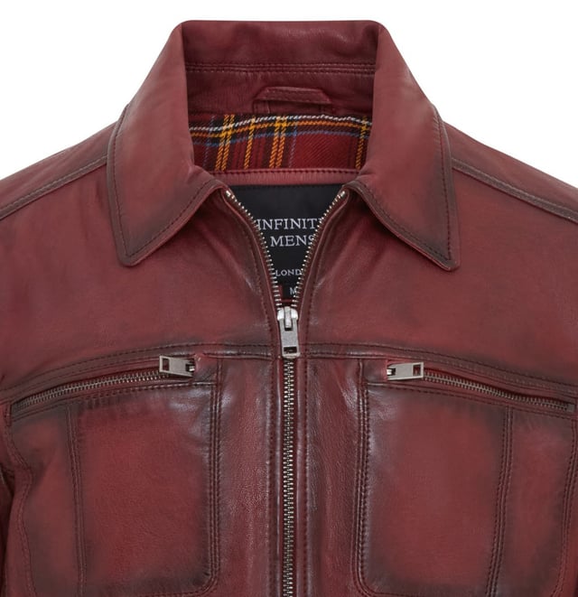 This Harrington biker jacket is a timeless classic, crafted from premium lamb leather with a vintage rub-off finish for a distinctive, worn-in look. Designed with functionality and style in mind, it features four outer zipped pockets and two internal pockets for practicality, along with a soft cotton lining for added comfort. The jacket’s sleek design, durable construction, and retro vibe make it an ideal choice for both casual outings and biker enthusiasts.

Premium lamb leather with a unique vintage rub-off finish.
Soft cotton lining for maximum comfort.
Four outer zipped pockets and two internal pockets for ample storage.
Classic Harrington collar for timeless style.
Durable front zip closure for easy wear.
Perfect for casual wear or adding a retro touch to your wardrobe.