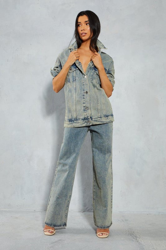 Oversized fit with dropped shoulders 
 Button front closure 
 Long sleeves with button cuffs 
 Chest pockets and welt hand pockets 

This denim oversized jacket from Misspap offers an effortlessly cool look. Crafted from cotton-rich denim in a stone washed finish, the jacket features an on-trend oversized silhouette with dropped shoulders and a relaxed fit through the body. Style with skinny jeans or leggings and a cropped top to balance the oversized shape. For cooler weather, layer over a chunky knit sweater. The versatile denim fabric and classic detailing make this an easy jacket to dress up or down. Throw it on over a slip dress and heeled sandals for drinks with friends or pair with trainers for a casual daytime look. With its slouchy borrowed-from-the-boys vibe, this jacket brings a laidback edge to any outfit. The stone wash gives it a lived-in, vintage appeal that reflects the Misspap aesthetic. A modern classic, it has the versatility to become a wardrobe staple for seasons to come.