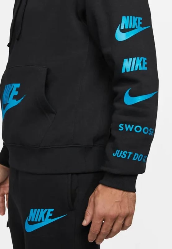 Nike Sportswear Standard Issue Hooded Tracksuit in Black Nike Men's Standard Issue Pullover Tracksuit set. - -. Soft and Warm comfortable Adjustable Drawcord Hood comes with Kangaroo Pouch Pocket, Logo Patch Pouch Pocket and multiple logos on the Sleeve, Elasticated Ribbed Cuffs & Hem Pullover Style hoodie. - -. Drawstring Closure Jogger, Elastic Cuffs and Drawcord Waistband for a Secure fit, the regular fit is Slim at the Hip and Relaxed through the Leg, 2 Side Pockets and Single cargo pocket design. - -. 80% Cotton, 20% Polyester. - -. Machine washable.