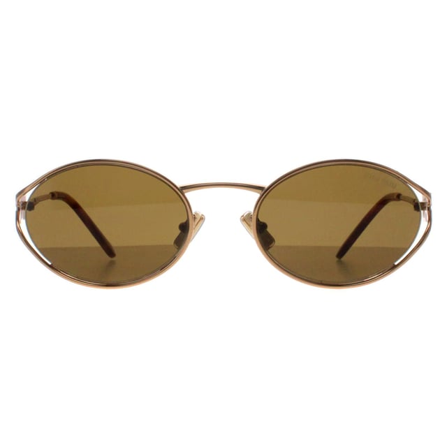 Miu Miu Oval Womens Brass Gold Dark Brown MU52YS  Sunglasses are a stunning fusion of contemporary style and timeless luxury. These sunglasses feature a striking oval frame, meticulously crafted from high-quality acetate for a lightweight and durable finish. The lenses offer superior UV protection, ensuring your eyes are well-shielded while exuding sophistication. Detailed with the iconic Miu Miu logo on the temples, the MU52YS sunglasses are designed for fashion enthusiasts who love to make a statement. Perfect for adding a touch of glamour to any outfit, these sunglasses are an essential accessory for those who appreciate cutting-edge design and classic charm.