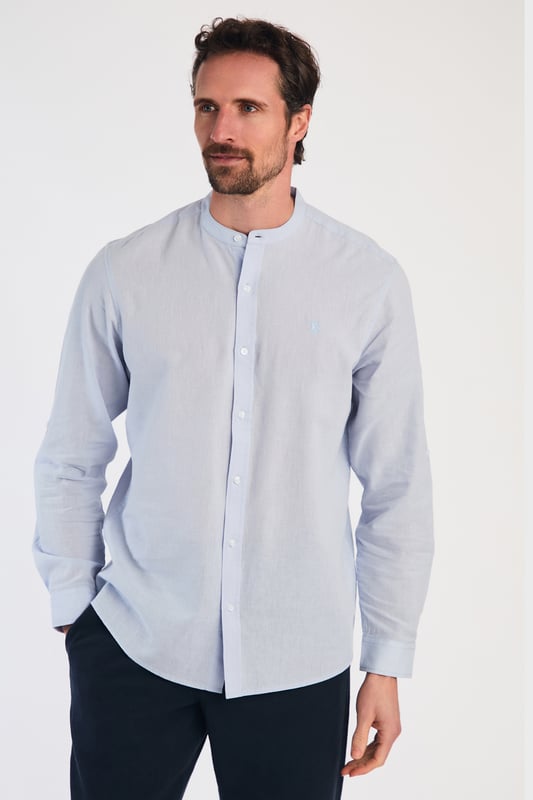Blue Linen Blend Long Sleeve Button-Up Shirt With Grandad Collar Upgrade your wardrobe with this long-sleeved linen shirt from Nines by Kensington Eastside. Made from a breathable blend of linen and cotton, this shirt features a grandad collar and button fastening. Perfect for casual and formal occasions, this machine-washable shirt is a versatile addition to any wardrobe.