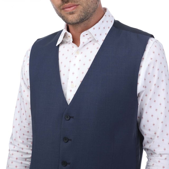 Ted Baker Formal Waistcoat voor heren in blauw.- Single breasted gilet met 5 knopen voor.- Comfortabele, ademende stof.- Slim fit.- Buitenkant: 88% Wol, 8% Polyester, 4% Elastaan. Ref: TB023WS.