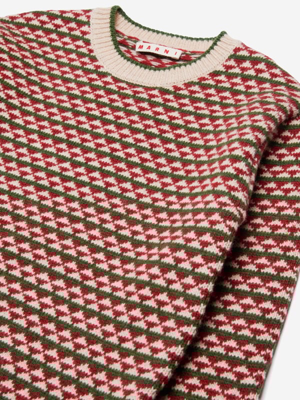 Discover the Marni Kids Wool Knitted Jumper in Red, an iconic addition to the AW2024 wardrobe for both boys and girls. Crafted with precision, it seamlessly offers luxury and warmth. Key highlights include: Luxurious 100% Wool: Crafted from the finest wool for unmatched warmth and soft feel. Vibrant Red Shade: A striking rich red that adds a burst of colour to any outfit. Unisex Design: Perfect for boys and girls, making it versatile and stylish.Elevate your child‚  style this autumn and winter with Marni‚  sophisticated touch. Shop now!