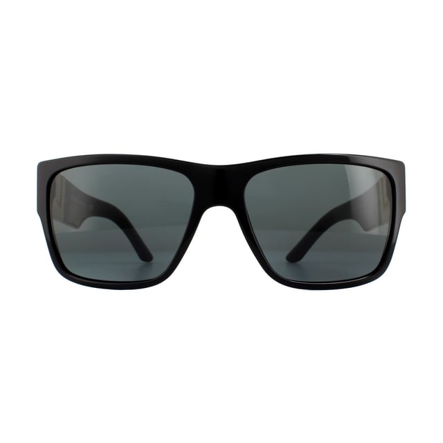 Versace Sunglasses VE4296 GB1/87 Black Grey are a bold square shape that features a sculpted metal Versace Greca logo at the hinges. The large metal logo contrasts perfectly against the acetate frame and creates an edgy look.