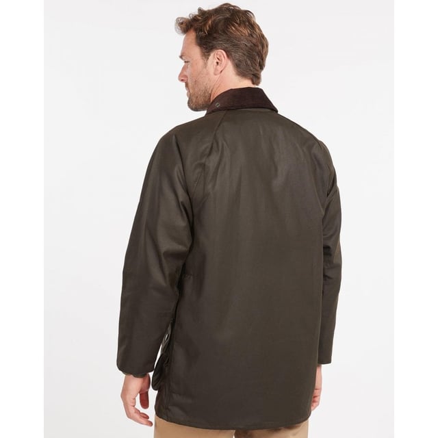 The Classic Beaufort is a stylish, practical men's waxed jacket with timeless country looks and a Sylkoil outer.
Quintessentially Barbour, this versatile jacket is tough enough to brave the great outdoors yet equally suited to city wear - it offers a relaxed fit perfect for throwing over a suit when commuting to work. Ideal for year-round use, it boasts a 100% cotton lining in Barbour's iconic tartan print, with an interactive zip designed for pairing with an optional quilted liner when extra insulation is needed.
The Classic Beaufort's smart corduroy collar feels luxuriously soft and is studded to take an optional hood, while the two-way zip, studded storm fly front and Velcro-fastening wind cuffs seal out draughts. Two lower bellow pockets offer plenty of room for essentials, and moleskin-lined handwarmer pockets provide welcome warmth on cold days. A useful rear game pocket completes the impressive line-up of functional features.

Mediumweight Barbour Sylkoil
Pure cotton Barbour Tartan lining
Corduroy collar
Two way zip
Two large bellow pockets
Two handwarmer pockets
Full width, lined, rear game pocket with side zips
Velcro fastening wind cuffs
Extra zip pocket underneath the storm flap
Studded storm fly
Length: 33-34ins | 84-86.5cm
Studded for optional hood
Interactive zip