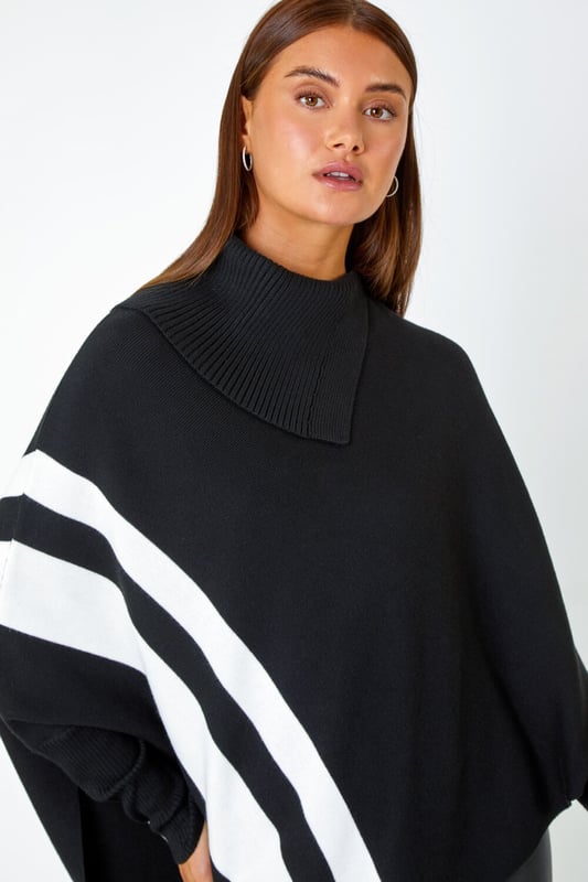 Roll Neck Wool Blend Stripe Poncho from Roman. Add some interesting knits to your collection this season with this asymmetric, stripe print poncho. Cut from a soft, wool-blend knit, this piece features a cosy roll neck and full-length sleeves. Adorned in a bold stripe print this poncho will make a seasonal statement this Autumn. Pair with leather trousers and boots for an on-trend, everyday style perfect for Christmas markets and cosy days out!