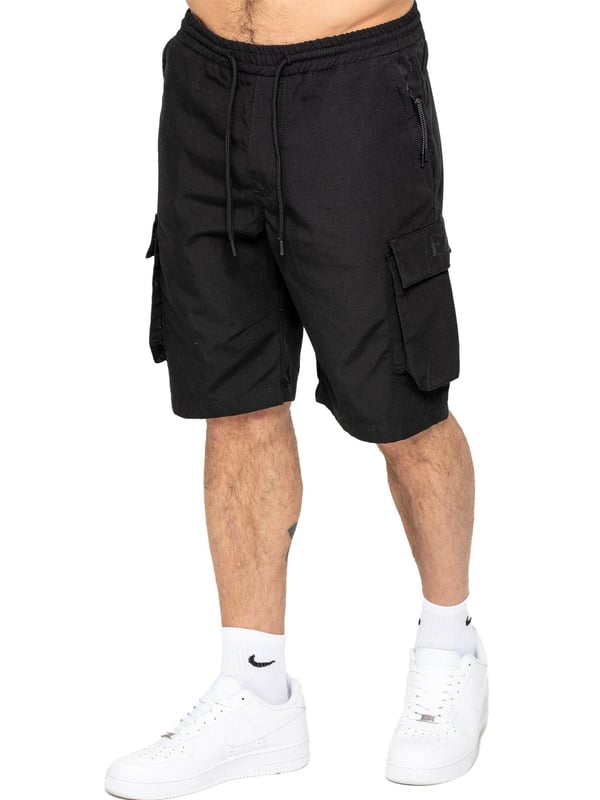 Expertly designed with top-quality ripstop fabric, these Enzo technical cargo shorts offer unparalleled durability. The convenient cargo pockets and zip side pockets make for easy storage, and the elasticated waistband with an adjustable drawstring ensures a comfortable fit. Upgrade your wardrobe and gear with this must-have for any outdoor enthusiast.