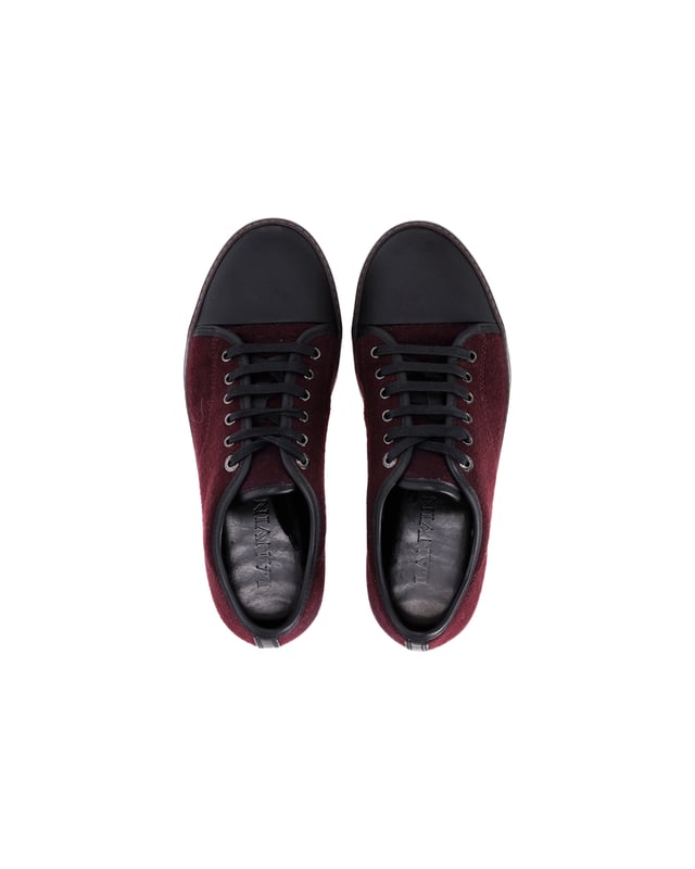 VINTAGE, RRP AS NEW
Elevate your sneaker game with the Lanvin DBB1 Matte Cap Toe Low Top Sneaker in Burgundy Suede. A true essential of the Lanvin men’s wardrobe, these sneakers are reimagined each season to offer a fresh take on a classic design. The low-top silhouette adds a casual touch, while the cap toe provides a refined, modern aesthetics. The burgundy suede material offers a sleek, sophisticated look that is perfect for any occasion. These sneakers embody the perfect blend of timeless style and contemporary flair, making them a must-have addition to any footwear collection. Make a statement with these Lanvin sneakers that seamlessly balance comfort and style.


With dust bag.

Lanvin DBB1 Matte Cap Toe Low Top Sneaker in Burgundy Suede
Color: Burgundy
Material: Suede
Condition: Very good
Size: EU40.5
Measurements: Heel height: 2; Insole length: 29
Signs of wear: Minor markings, Lightly used but very well maintained. Minor mark at soles & creasing, light scuffing at the soles and heels.
SKU: 367921