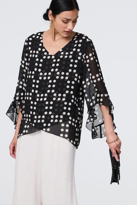 Get all of the style with none of the effort thanks to this blouse. It has a v-neck and 3/4 flared sleeves that will look timeless and elegant, whether you're wearing it for work or leisure. Plus, it has a semi sheer mesh layer and a modern curve hem for a unique finishing touch. Wear with smart trousers, a skirt or even jeans for a chic look.