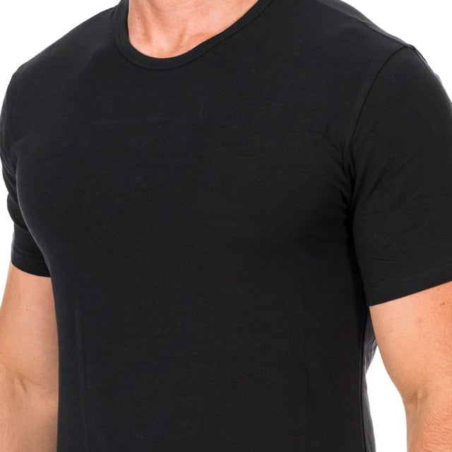 Pack-2 Calvin Klein Short Sleeve T-Shirts. 
 Black color. 
 Made of elastic cotton. 
 Round neck with ribbed finish. 
 Personalized fabric tag by the mark, on the bottom side. 
 Comfortable and breathable fabric. 
 Stitched seams. 

 Composition: 
 - 95% Cotton. 
 - 5% Elastane. 

 Washing instructions: 
 -Wash the max. 40 ° C. 
 -Do not use bleach. 
 -Washing dry cleaning. 
 -Does use dryer. 
 -Turn to max. 130 ° C.