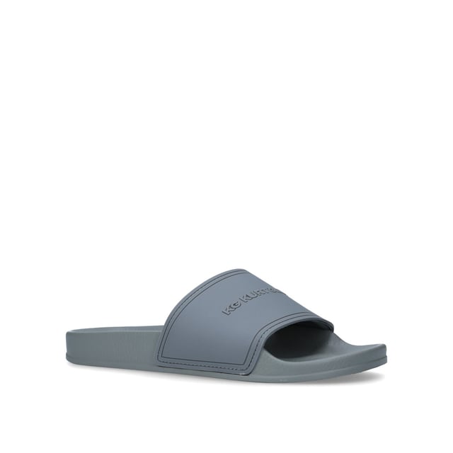 KG Kurt Geiger Ibiza Sandals Ibiza from KG Kurt Geiger is a flat slider sandal in grey.