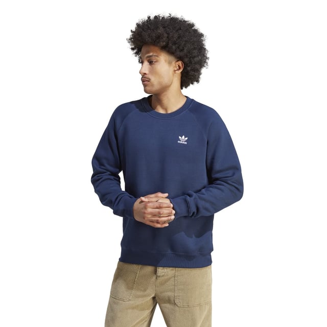 Mens adidas Originals Trefoil Essentials Crewneck Sweatshirt in navy.- Ribbed crewneck.- Ribbed cuffs and hem.- Small Trefoil logo.- Regular fit.- 70% Cotton  30% Polyester (100% Recycled).- Ref: IM4536