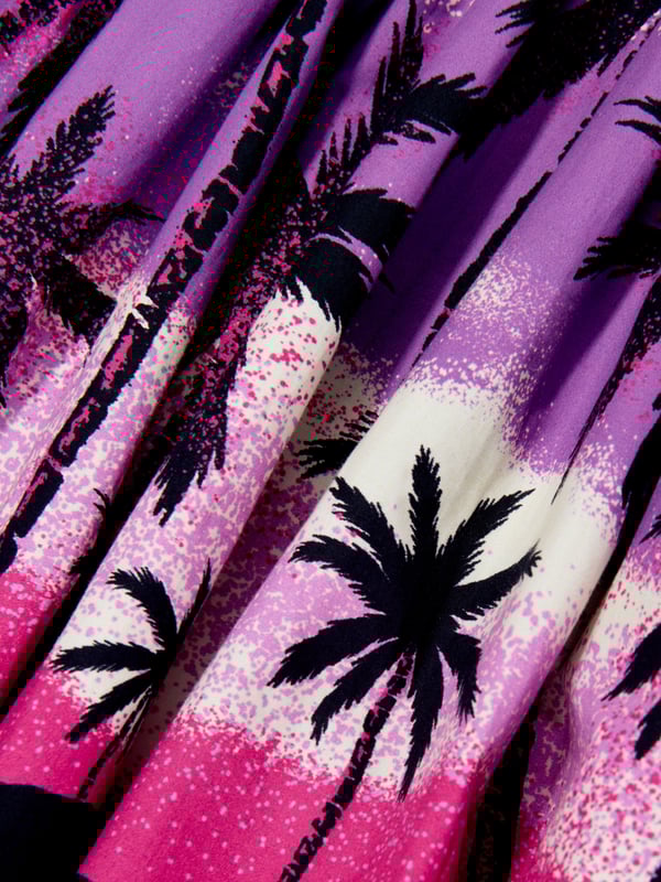 Molo inject passion and an eccentric outlook into their aesthetics. This girls twilight dress is reflective of the label's ostentatious technological properties. Crafted in a strapless off-white organic cotton design showcasing a print of a deserted island in shades of purple, pink and black that are reminiscent of a Hawaiian summer.‚ Empire Waist‚ Full Skirt‚ Narrow Straps‚ Hidden Zipper At Side Seam ‚ 100% Organic Cotton‚ GOTS Organic Certified By Ecocert Greenlif