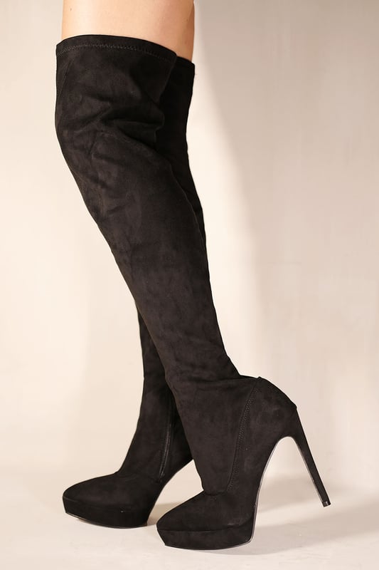 Where's That From Womens 'Veena' Pointed Toe Knee High Heel Platform Boots These boots will make you feel like a million bucks. You won't be able to walk around your house or down the block without catching people's attention. The style is sleek and sexy, bringing elegance to any outfit. These booties will get your feet warm and cozy but also show off that elegant, COMFY silhouette.