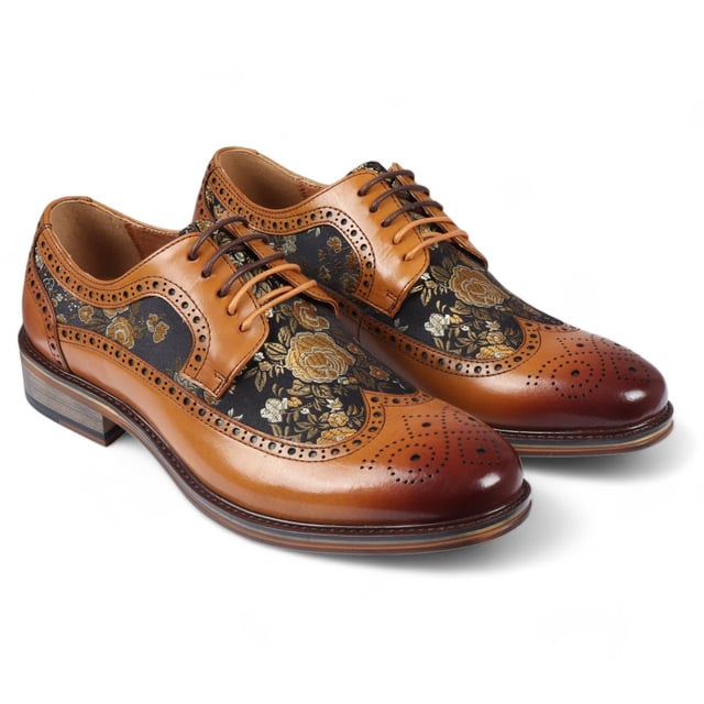 Añade un toque único a tu vestuario formal con los zapatos brogue de cuero con estampado floral para hombre de Ross. Fabricados 100 % con cuero de primera calidad, estos zapatos brogue combinan estilo, durabilidad y comodidad. Con detalles brogue clásicos con patrones decorativos, aportan elegancia y sofisticación a cualquier look. Estampado floral único para una declaración audaz y elegante Cuero de primera calidad para mayor durabilidad y lujo Detalles brogue clásicos para un atractivo atemporal Diseño con cordones para un ajuste ajustable