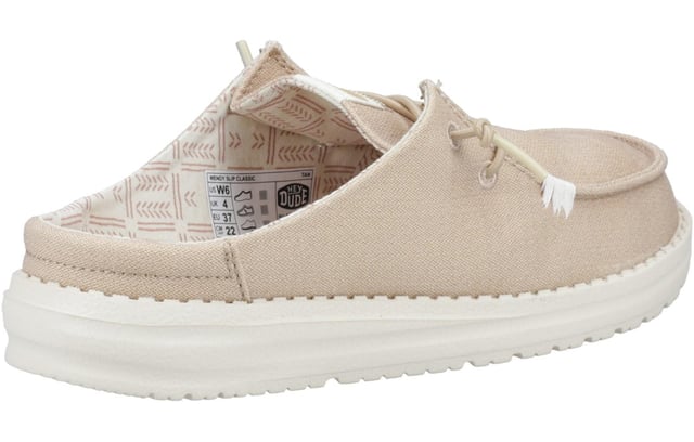 The Hey Dude Wendy Classic Mule is the ultimate in easy-going style, blending all-day comfort with eye-catching patterns and versatile colours to suit any look. Made with a soft textile upper and a supportive raised back heel, this shoe provides a secure yet relaxed fit. The elasticated laces make slipping it on a breeze, while the lightweight, flexible outsole offers responsive support with every step. Complete with a removable foam insole for customizable cushioning, the Wendy Slip Classic Mule is designed to be your go-to for effortless style and unbeatable comfort all day long.
 - Textile upper 
 - Raised back heel 
 - Elasticated laces 
 - Removable foam insole 
 - Flexible outsole