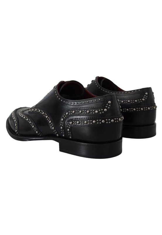 Dolce & Gabbana Men's Black Leather Derby Dress Studded Shoes Brand: DOLCE & GABBANA
Model: Lace up derby shoes
Color: Black with silver studs
Material: 100% Leather
Leather sole
Logo details
Made in Italy
Gender: Men
Material: 100% Leather