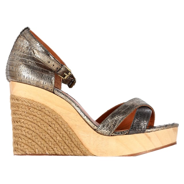 VINTAGE, RRP AS NEW
Step into luxury and modern elegance with the Lanvin Snake-Embossed Espadrille Slingback Wedge Sandals in Silver Leather. Crafted from premium silver leather, these sandals feature a striking snake-embossed texture that adds depth and sophistication to their design. The slingback strap ensures a secure and comfortable fit, while the espadrille wedge heel combines timeless style with a contemporary edge. The metallic silver finish elevates any look, making them the perfect statement piece for both daytime and evening wear. Whether paired with dresses, skirts, or cropped trousers, these sandals add a touch of glamour and edge to your summer wardrobe.

 Lanvin Snake-Embossed Espadrille Slingback Wedge Sandals in Silver Leather

Condition: Excellent
Signs of wear: No visible sign of wear. No Mark at insole.,  Very light mark at soles.
Packaging: Dust bag
Color: Silver
Material: Leather | leather
Size: FR | 40/UK7/US8/IT39
Measurements: Heel height: 110; Insole length: 240
SKU: NAPPUGBSH424966W