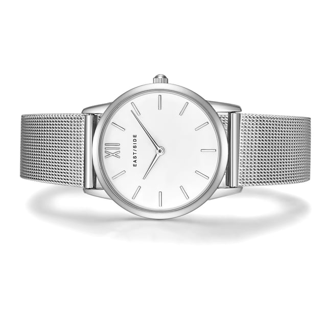 Subtle refraction is the trademark of the New York district of Eastside - as well as the Eastside watch label of the same name. This enchanting women's model reflects on traditional watch design away from opulence and glamor. Understatement is the order of the day! Tone kept in sound, combine the housing with high-quality screwed stainless steel floor and the elaborately worked stainless steel-milanaise bracelet cool elegance and hard-wearing materials. The dial is discreetly in the background and is reduced to the traditional function of a timepiece, with filigree barnacles and delicate swords.