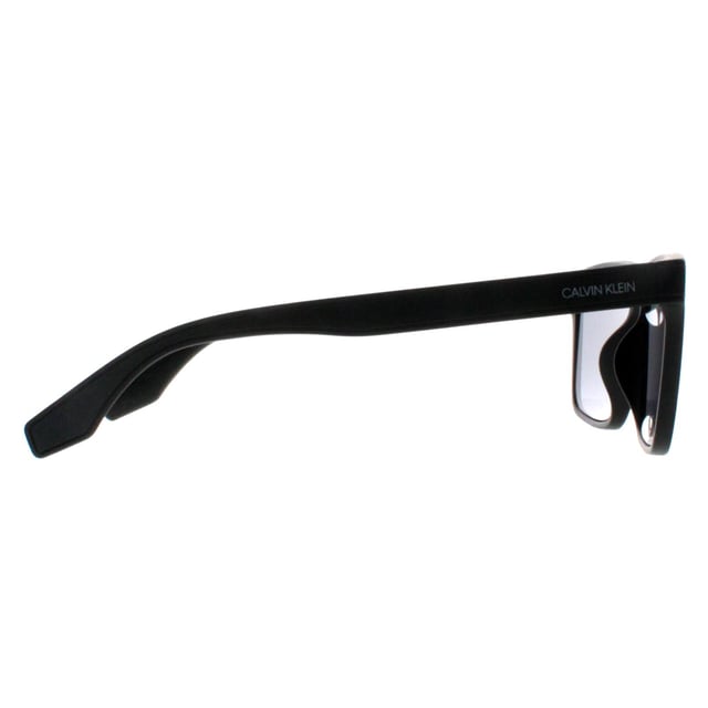 Calvin Klein Square Unisex Matte Cargo Solid Smoke CK20521S  Sunglasses are a stylish square frame made from lightweight acetate. The Calvin Klein logo features on the slender temples for brand authenticity.