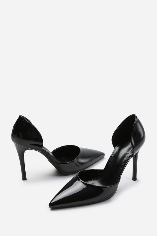 Wheres That From Womens 'Aspen' Pointed Toe Stiletto High Heels Instantly elevate your style with our Aspen Pointed Toe Stiletto High Heels. These heels are a must-have for any fashion-forward individual, combining elegance and sophistication in one chic package.
Key Features:
Effortless Style: The timeless design of these stiletto heels exudes elegance and grace. They effortlessly elevate your outfit, adding a touch of sophistication and beauty that catches everyone's attention.
All-Day Comfort: Our heels are crafted with your comfort in mind. Despite the high heel, they feature a cushioned insole that provides maximum comfort.
Secure Fit: The classic design features a pointed toe and a secure, slip-on style. This heels hugs your foot for a snug fit, ensuring stability and confidence with every step.
Durable Construction: Made with high-quality materials, our High Heel Stiletto heels are built to last. The sturdy construction and reliable stitching ensure durability, making them practical for any occasion.
Sophisticated Design: The stiletto heel adds height and elegance, giving you a sleek silhouette. The pointed toe elongates your legs, creating a flattering and feminine look that is both powerful and refined.
Specifications:
Material: Patent Faux Leather
Heel height: 4.6 inches
Toe shape: Pointed
Invest in our Aspen Pointed Toe Stiletto High Heels for a perfect combination of style, comfort, and confidence. Embrace timeless elegance and enjoy the compliments that come your way. Get yours today and step into a world of sophistication and poise!