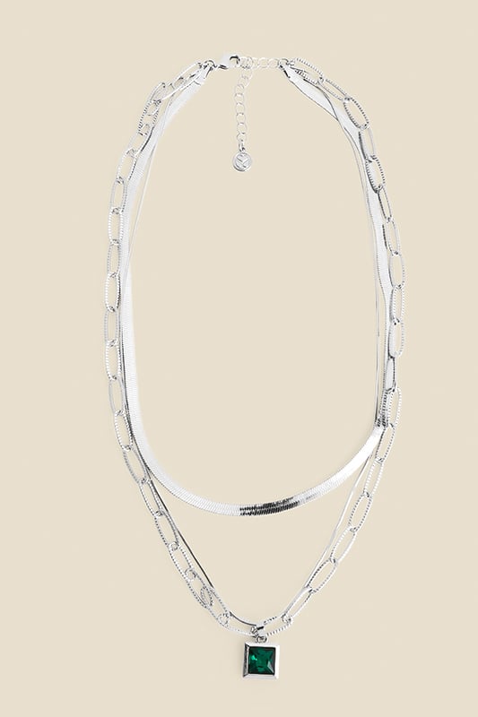 We've done the styling for youThree chains for an on-trend layered lookSet with a sparkling green stoneChic silver finishElevate your everyday outfitsShow it off with a sexy bandeau top