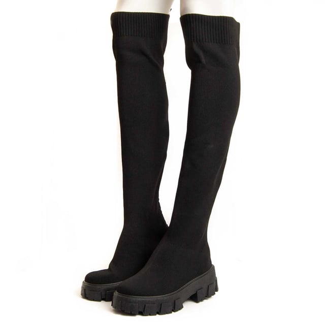 Plateaustiefel für Damen. Bequeme Passform. Hergestellt aus veganen Materialien. Hergestellt von anderen Marken für unsere Marke. Ungefähre Maße: 5 cm Absatz, 3 cm Plateau, 55 cm Schafthöhe und 12 cm Schaftbreite.