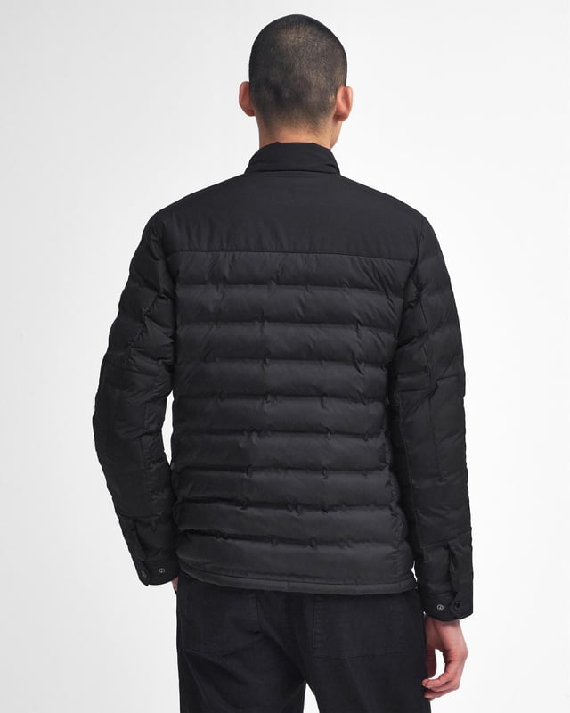 B.Intl Welded Ariel Puffer Jacket
Inspired by our rich motorcycle heritage and our signature waxed jacket designs, the B.Intl Welded Ariel Puffer jacket is display of our iconic details. Featuring two angled pockets to the chest - which featured on our waxed jackets as a way to easily access a map when riding - it's also detailed with a studded throat tab for added protection from the elements. 

Tailored fit
Main fabric: Face: 100% Polyester, Back: 100% Polyester
Trim: 100% Polyester
Inner: 100% Polyester
Filling: 100% Polyester
Machine wash 30°C - very mild process
Back length: 72cm

MQU1827