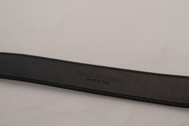 Brand new with tags
  100% Authentic Dolce & Gabbana belt
  Made from Quality leather
  Metal buckle closure
  Unique eye-catching design
  Dark blue color
  Width: 2.5cm
  Made in Italy
  Tag size: 90cm / 36in
  Perfect for men