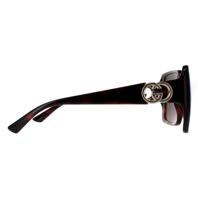 Gucci Square Womens Dark Havana with Gold Dark Brown GG1692S  Sunglasses feature a striking, oversized frame with a unique, softly contoured shape that enhances any look with a touch of glamour. Embellished with the iconic double-G logo on the temples, the GG1692S model proudly showcases the essence of Gucciâ€™s timeless style. The high quality lenses ensure exceptional UV protection, making them as practical as they are stylish. Available in a variety of refined colors, these sunglasses are the perfect choice for those who seek to combine bold elegance with modern fashion sensibilities.