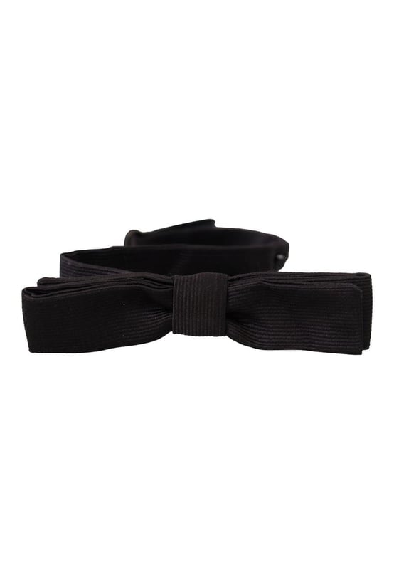 100% Authentic Dolce & Gabbana bow tie
  Exclusive item from the Dolce & Gabbana collection
  Color: Black
  Model: Tied
  Material: 100% Silk
  Adjustable length neck strap
  One size fits all
  Made In Italy