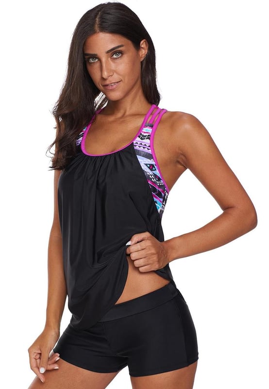 Womens tankini top
  Made of 82% Nylon and 18% Spandex
  Blouson style with a striped print
  Adjustable strappy T-back
  Push-up design to enhance the bust
  Suitable for beach or pool
Material: 82% Nylon 18% Spandex