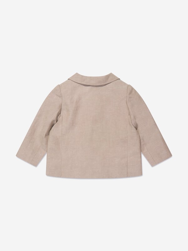 The Baby Boys Linen Leopold Blazer in Brown by Bonpoint is the ideal addition to your young one's wardrobe this Eid. Below are the defining features:Exquisite Design: With a unique print, this blazer makes a dashing statement, striking the right balance between trendy and timeless.Superior Comfort: Crafted from premium linen, it ensures your baby stays cosy and comfy, enhancing their festive experience.Elevate their attire with this linen blazer, adding a touch of luxury and elegance. Be the first to grab this must-have Bonpoint piece and let your little one shine!