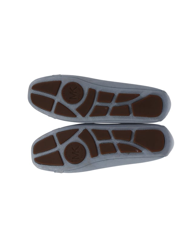 VINTAGE, RRP AS NEW
Michael Kors is known for footwear that can enhance your professional look. This pair of glamorous shoes by them has a pastel blue leather exterior. These flats have a closed toe style with a slip on finish. Wear them with a formal blouse and skirt combination.

Michael Kors Fulton Moccasin Flats in Pastel Blue Leather
Material: Leather
Color: Pastel Blue
Size: EU40.5/US10.5/UK7.5
Condition: excellent
Sign of wear: Minimal signs of wear on soles and exterior leather; Comes with box
SKU: 167653