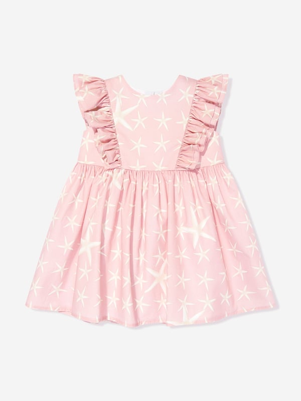 Introducing the Baby Girls Starfish Marina Dress in Pink by Versace, an essential upgrade for your little fashionista‚  AW2024 wardrobe from Italy. Experience the blend of luxury and playfulness. Key features include: Italian Luxury: Impeccably crafted in Italy, synonymous with unparalleled quality. Iconic Starfish Motif: Embellished with a chic starfish print, capturing the essence of whimsical elegance. Premium Fabric: Constructed with the softest fabrics to ensure comfort and ease for all-day wear. Perfect Pink: A vibrant pink hue that complements the playful design, making it a strikingly beautiful garment.revitalise her collection with this stunning designer dress by Versace. Order now for timeless style and unmatched quality!