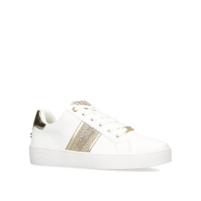 This Carvela Rapid trainer features a white upper with gold details across the upper. There is crystal embellishment on the tongue and side panels.